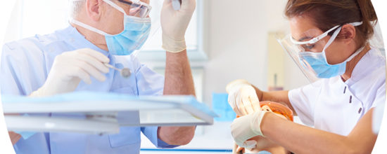 Header image of dental staff and patient