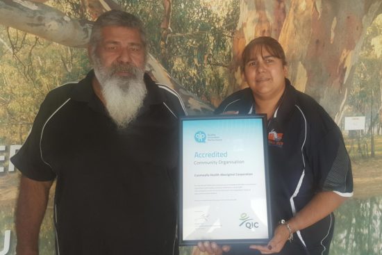Image of Coomealla staff with certificate