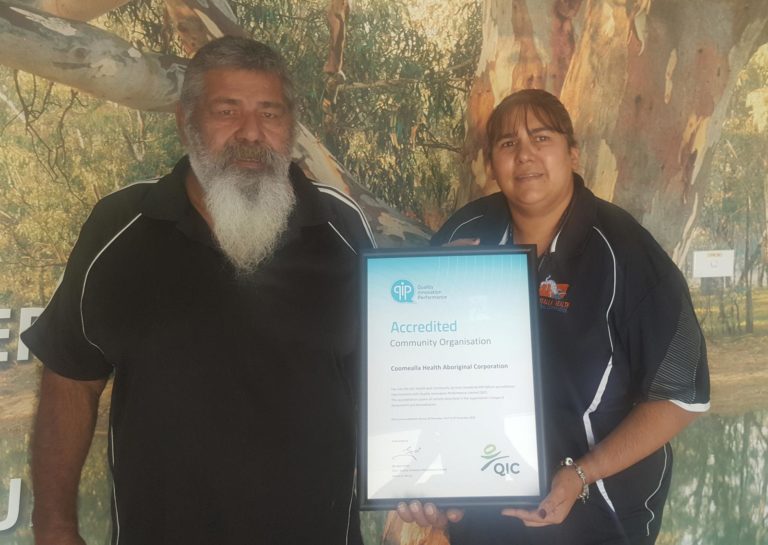 Image of Coomealla staff with certificate