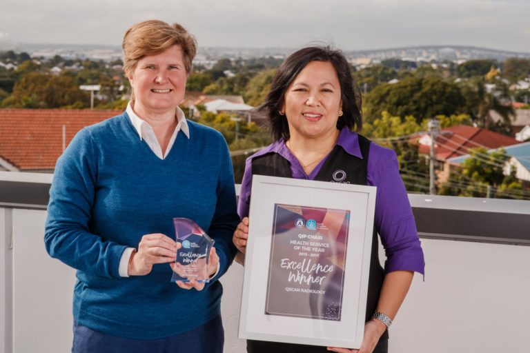 Image of Qscan staff with their award